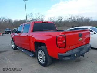 2016 Chevrolet Silverado 1500 LT with VIN 3GCPCREC0GG135790, listed as a IAAI auction lot 41695861 with 256,484 mi miles. Bid and sale history available at carsss.com. Image 3.