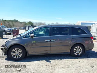 2017 Honda Odyssey SE with VIN 5FNRL5H37HB010208, listed as a IAAI auction lot 41828809 with 67,399 mi miles and . Bid and sale history available at carsss.com. Image 14.