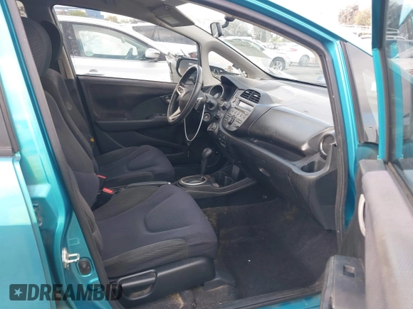 2012 Honda Fit Sport with VIN JHMGE8H57CC005728, listed as a IAAI auction lot 42138114 with 176,399 mi miles and . Bid and sale history available at DreamBid. Image 5.