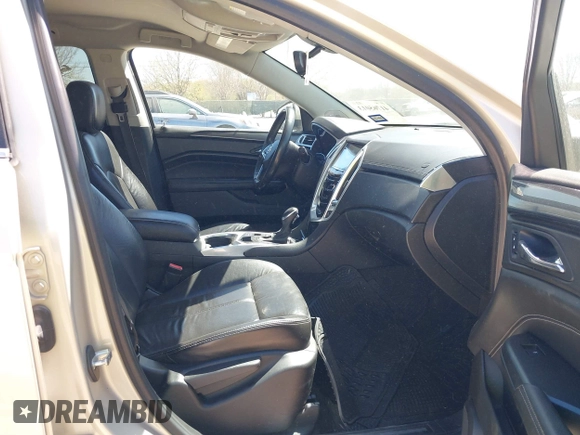 2013 Cadillac SRX z VIN 3GYFNAE33DS654844, wystawiony jako IAAI lot #41765013 z przebiegiem 117 616 mil mil oraz . Historia ofert i sprzedaży dostępna na DreamBid. Obrazek 5.