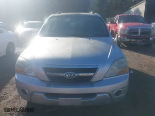 2009 Kia Sorento LX with VIN KNDJD735X95872078, listed as a IAAI auction lot 41201260 with 202,674 mi miles. Bid and sale history available at carsss.com. Image 6.