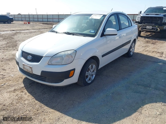 2008 Kia Rio LX with VIN KNADE123286297729, listed as a IAAI auction lot 42007714 with 51,268 mi miles. Bid and sale history available at carsss.com. Image 2.