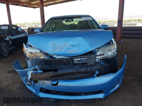 2012 Toyota Camry XLE z VIN 4T1BD1FK8CU003863, wystawiony jako IAAI lot #42336910 z przebiegiem 103 993 mil mil oraz . Historia ofert i sprzedaży dostępna na DreamBid. Obrazek 6.