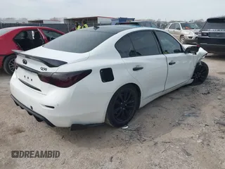 2015 Infiniti Q50 z VIN JN1BV7APXFM335981, wystawiony jako IAAI lot #41718555 z przebiegiem 83 918 mil mil oraz . Historia ofert i sprzedaży dostępna na DreamBid. Obrazek 4.
