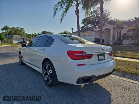 2017 BMW 7 Series 740i with VIN WBA7E2C54HG740427, listed as a Copart auction lot 54992345 with 93,252 mi miles and Clean Title. Bid and sale history available at carsss.com. Image 3.