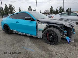 2021 BMW M4 with VIN WBS53AZ0XMCG52209, listed as a Copart auction lot 50234375 with 19,701 mi miles and Salvage title. Bid and sale history available at DreamBid. Image 4.