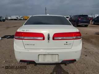 2012 Lincoln MKZ z VIN 3LNHL2GC5CR821004, wystawiony jako IAAI lot #41920319 z przebiegiem 91 081 mil mil oraz . Historia ofert i sprzedaży dostępna na DreamBid. Obrazek 16.