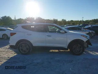2017 Hyundai Santa Fe 2.4L z VIN 5XYZU3LB4HG435992, wystawiony jako IAAI lot #40927607 z przebiegiem 104 868 mil mil oraz . Historia ofert i sprzedaży dostępna na DreamBid. Obrazek 14.