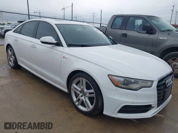2014 Audi A6 Prestige with VIN WAUHGAFC6EN154497, listed as a IAAI auction lot 42189308 with 97,472 mi miles and . Bid and sale history available at DreamBid. Image 1.