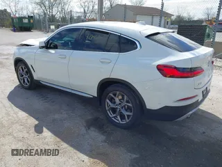 2021 BMW X4 xDrive30i with VIN 5UX2V1C03M9F12611, listed as a IAAI auction lot 42145740 with 60,417 mi miles and . Bid and sale history available at DreamBid. Image 3.