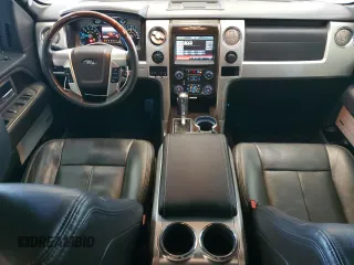 2014 Ford F-150 XL with VIN 1FTFW1ETXEFB39719, listed as a Copart auction lot 62073335 with 124,643 mi miles and Salvage title. Bid and sale history available at DreamBid. Image 8.