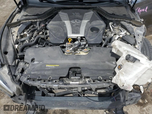 2017 Infiniti Q50 Premium z VIN JN1EV7AP3HM734425, wystawiony jako Copart lot #51866275 z przebiegiem 160 813 mil mil oraz Szkoda całkowita • Salvage title. Historia ofert i sprzedaży dostępna na DreamBid. Obrazek 12.
