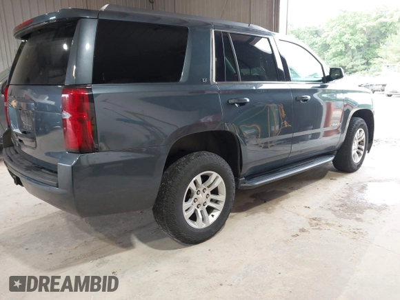 2020 Chevrolet Tahoe LT with VIN 1GNSKBKC3LR161181, listed as a IAAI auction lot 42536094 with 129,939 mi miles and . Bid and sale history available at DreamBid. Image 4.