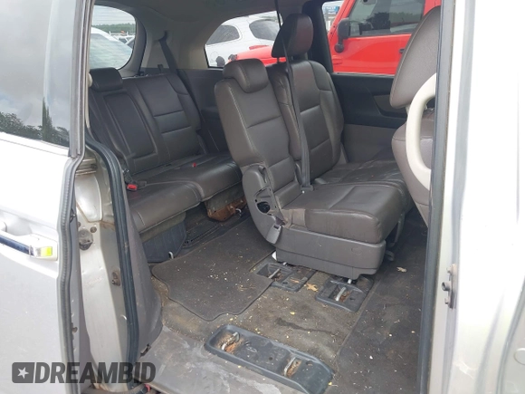 2011 Honda Odyssey Touring with VIN 5FNRL5H93BB071518, listed as a IAAI auction lot 42402421 with 227,647 mi miles and . Bid and sale history available at DreamBid. Image 8.