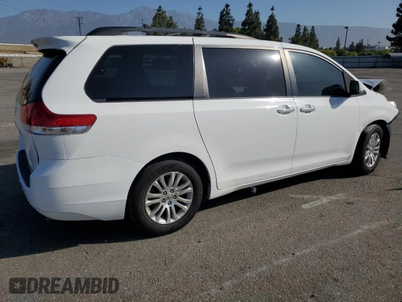 2013 Toyota Sienna XLE AAS with VIN 5TDYK3DC5DS322039, listed as a Copart auction lot 61657715 with 185,269 mi miles and Salvage title. Bid and sale history available at DreamBid. Image 3.