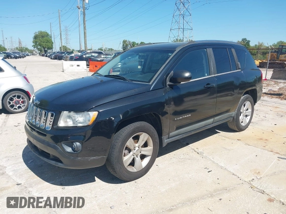 2011 Jeep Compass with VIN 1J4NT1FB6BD195524, listed as a IAAI auction lot 41844275 with 158,534 mi miles. Bid and sale history available at carsss.com. Image 2.