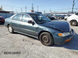 1997 Honda Accord LX with VIN 1HGCD5638VA107882, listed as a Copart auction lot 52155415 with 234,525 mi miles and Salvage Title. Bid and sale history available at carsss.com. Image 4.