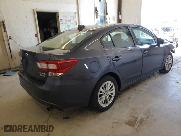 2017 Subaru Impreza Premium with VIN 4S3GKAD61H3613655, listed as a Copart auction lot 63148412 with 75,425 mi miles. Bid and sale history available at carsss.com. Image 4.