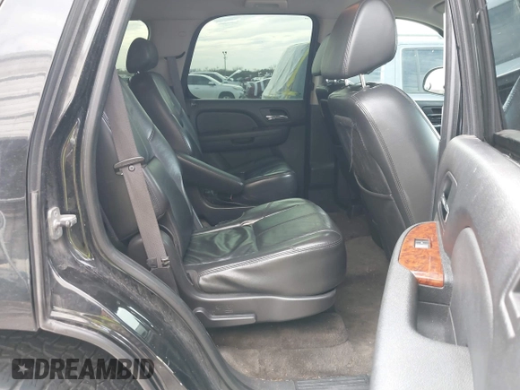 2011 Chevrolet Tahoe Commercial with VIN 1GNLC2E00BR325388, listed as a IAAI auction lot 41472731 with 265,781 mi miles and . Bid and sale history available at DreamBid. Image 8.