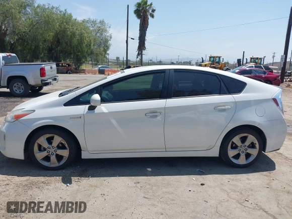 2013 Toyota Prius One z VIN JTDKN3DU6D5612205, wystawiony jako IAAI lot #42487114 z przebiegiem 221 772 mil mil oraz . Historia ofert i sprzedaży dostępna na DreamBid. Obrazek 14.