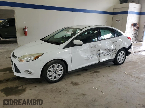 2012 Ford Focus SE with VIN 1FAHP3F20CL451852, listed as a Copart auction lot 60310765 with 150,305 mi miles and Salvage title. Bid and sale history available at DreamBid. Image 1.