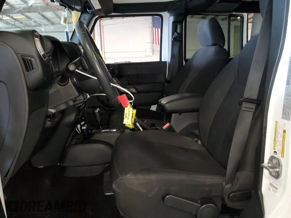 2018 Jeep Wrangler JK Unlimited Sport with VIN 1C4BJWDG7JL814436, listed as a Copart auction lot 45557095 with 67,755 mi miles and Salvage Title. Bid and sale history available at carsss.com. Image 7.