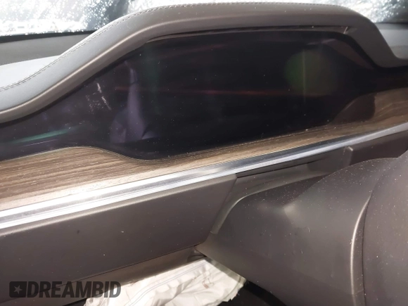 2022 Tesla Model S with VIN 5YJSA1E57NF484158, listed as a IAAI auction lot 41531574 with 16,079 mi miles and . Bid and sale history available at DreamBid. Image 7.