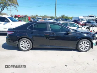2020 Toyota Camry LE с VIN 4T1C11AK8LU896458, выставлен на аукционе IAAI как лот 38706254 с пробегом 159 713 миль миль и . История ставок и продаж доступна на DreamBid. Изображение 14.