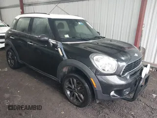 2014 MINI Countryman S z VIN WMWZC5C53EWP40677, wystawiony jako IAAI lot #41473281 z przebiegiem 108 616 mil mil oraz . Historia ofert i sprzedaży dostępna na DreamBid. Obrazek 1.