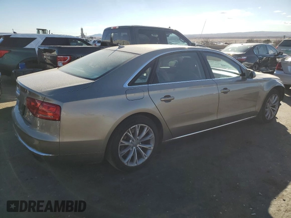 2012 Audi A8 with VIN WAURVAFDXCN001749, listed as a Copart auction lot 44379515 with 169,860 mi miles and Salvage Title. Bid and sale history available at DreamBid. Image 3.