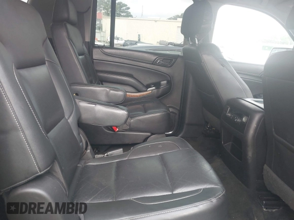 2018 Chevrolet Suburban Premier with VIN 1GNSCJKC9JR100504, listed as a IAAI auction lot 42276280 with 153,916 mi miles and . Bid and sale history available at DreamBid. Image 8.