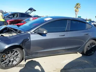 2022 Tesla Model 3 with VIN 5YJ3E1EA3NF165054, listed as a IAAI auction lot 41805729 with 225,773 mi miles. Bid and sale history available at carsss.com. Image 13.