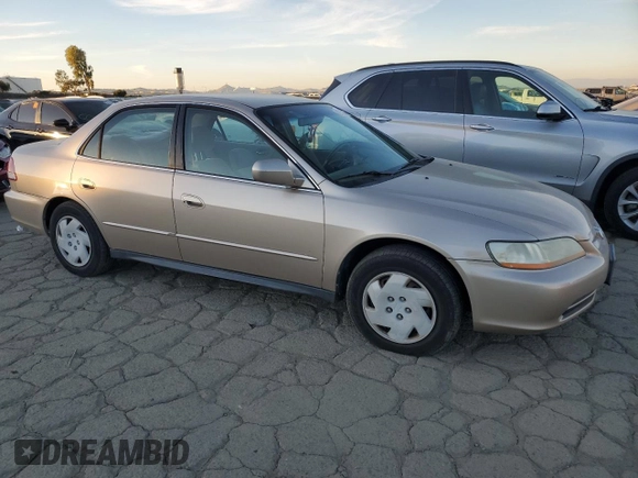 2001 Honda Accord LX z VIN 1HGCG16461A067174, wystawiony jako Copart lot #87543245 z przebiegiem 148 410 mil mil oraz Czysty tytuł • Clean title. Historia ofert i sprzedaży dostępna na DreamBid. Obrazek 4.