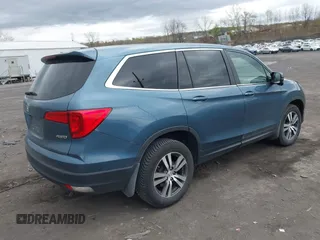 2017 Honda Pilot EX-L with VIN 5FNYF6H50HB101394, listed as a IAAI auction lot 42083318 with 159,359 mi miles and . Bid and sale history available at DreamBid. Image 4.