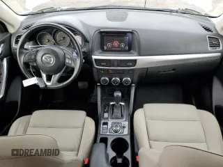 2016 Mazda CX-5 Touring with VIN JM3KE4CY7G0821701, listed as a Copart auction lot 43805495 with 144,416 mi miles and Salvage Title. Bid and sale history available at carsss.com. Image 8.