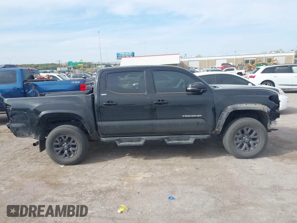 2023 Toyota Tacoma 4WD SR with VIN 3TYCZ5AN4PT170688, listed as a IAAI auction lot 41998053 with 20,770 mi miles. Bid and sale history available at carsss.com. Image 14.