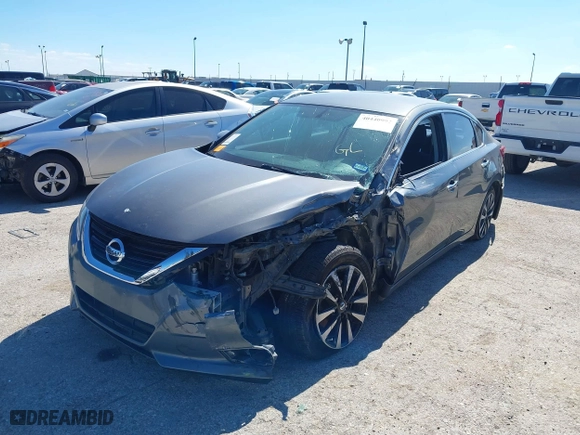 2018 Nissan Altima 2.5 SV with VIN 1N4AL3AP1JC102695, listed as a IAAI auction lot 40440992 with 58,063 mi miles. Bid and sale history available at carsss.com. Image 6.