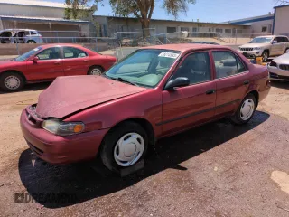 2000 Toyota Corolla VE with VIN 1NXBR12E1YZ401084, listed as a Copart auction lot 58214585 with 276,533 mi miles and Salvage title. Bid and sale history available at DreamBid. Image 1.