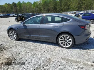 2019 Tesla Model 3 Mid Range z VIN 5YJ3E1EA7KF397524, wystawiony jako Copart lot #52696585 z przebiegiem 82 995 mil mil oraz Szkoda całkowita • Salvage title. Historia ofert i sprzedaży dostępna na DreamBid. Obrazek 2.