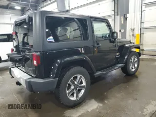 2013 Jeep Wrangler Sahara z VIN 1C4AJWBG5DL566559, wystawiony jako Copart lot #54823405 z przebiegiem 134 099 mil mil oraz Szkoda całkowita • Salvage title. Historia ofert i sprzedaży dostępna na DreamBid. Obrazek 3.