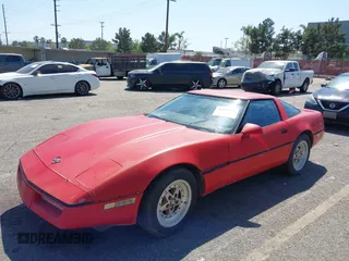 1985 Chevrolet Corvette with VIN 1G1YY0789F5103932, listed as a IAAI auction lot 42004684 with 116,413 mi miles. Bid and sale history available at carsss.com. Image 2.