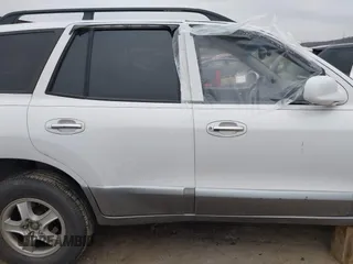 2003 Hyundai Santa Fe GLS with VIN KM8SC13E33U520344, listed as a IAAI auction lot 41528796 with 246,923 mi miles. Bid and sale history available at carsss.com. Image 13.