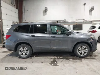 2016 Honda Pilot LX with VIN 5FNYF6H1XGB111488, listed as a IAAI auction lot 41581706 with 100,028 mi miles. Bid and sale history available at carsss.com. Image 13.