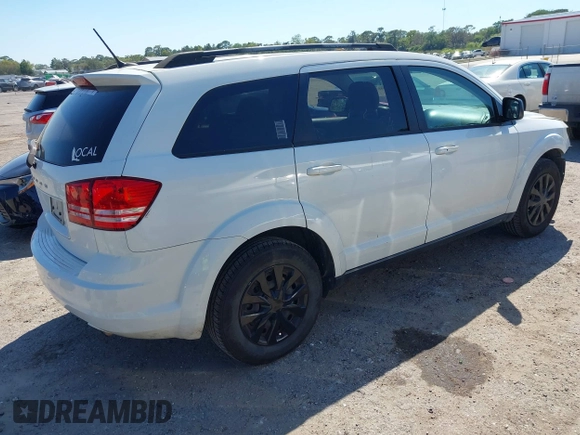 2017 Dodge Journey SE with VIN 3C4PDCAB5HT569154, listed as a IAAI auction lot 41891552 with 126,861 mi miles and . Bid and sale history available at DreamBid. Image 4.