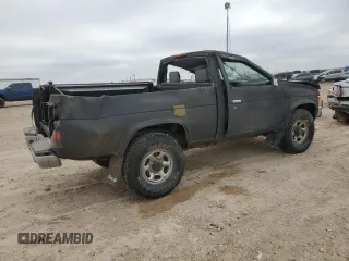 1995 Nissan Frontier XE with VIN 1N6SD11Y2SC308065, listed as a Copart auction lot 45282595 with 51,994 mi miles and Salvage title. Bid and sale history available at DreamBid. Image 3.