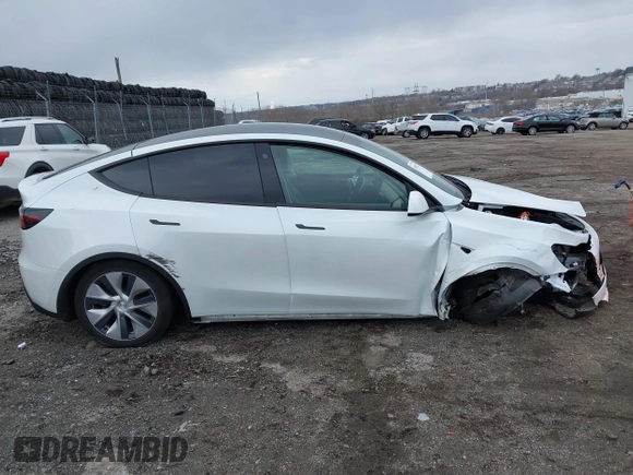 2022 Tesla Model Y Long Range with VIN 7SAYGAEE4NF516625, listed as a IAAI auction lot 41892225 with 33,054 mi miles and . Bid and sale history available at DreamBid. Image 13.