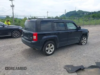 2014 Jeep Patriot Latitude with VIN 1C4NJRFB0ED892203, listed as a IAAI auction lot 42617739 with 100,607 mi miles and . Bid and sale history available at DreamBid. Image 4.