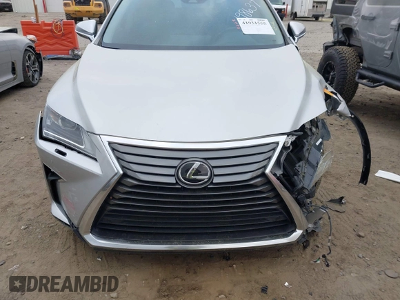 2016 Lexus RX 350 with VIN 2T2BZMCA1GC046992, listed as a IAAI auction lot 41931555 with 76,278 mi miles and . Bid and sale history available at DreamBid. Image 13.
