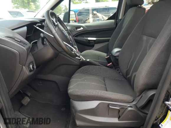 2017 Ford Transit Connect XLT with VIN NM0LS7F79H1324491, listed as a Copart auction lot 60055345 with 128,463 mi miles and Salvage title. Bid and sale history available at DreamBid. Image 7.