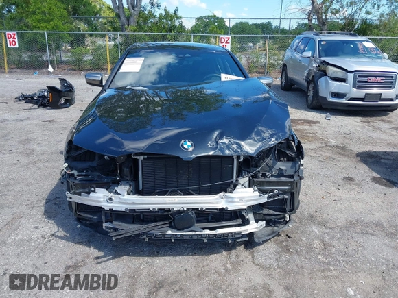 2019 BMW 5 Series M550i xDrive with VIN WBAJB9C51KB289355, listed as a IAAI auction lot 41867984 with 30,106 mi miles and . Bid and sale history available at DreamBid. Image 6.